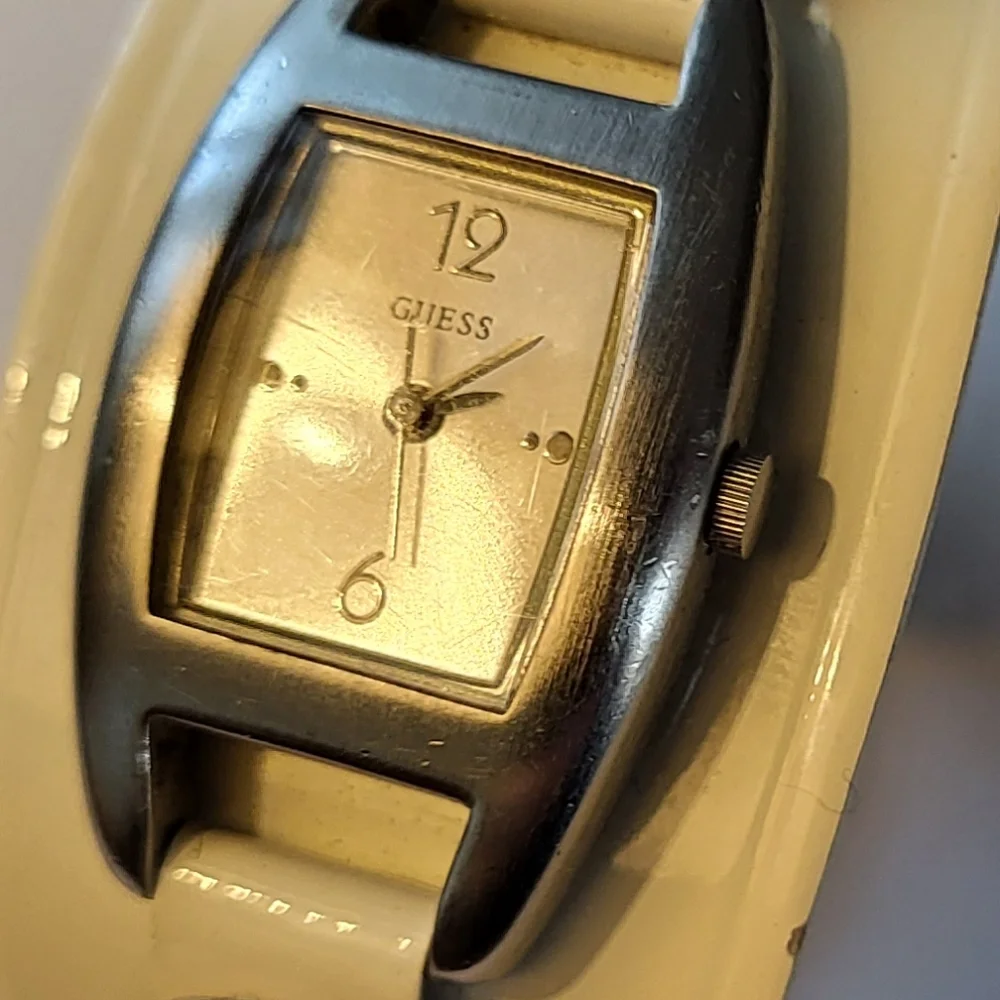 GUESS Women's Watch with Cream Leather Band And Silver Metal Accents